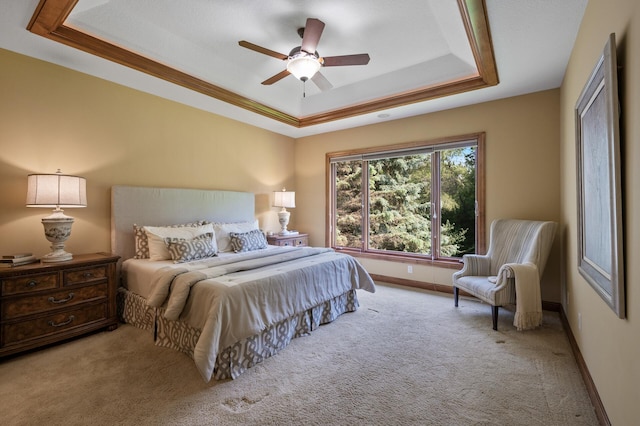8867 Aviary Path, Inver Grove Heights, MN 55077 - bedroom with a tray ceiling, carpet floors, baseboards, a ceiling fan, and crown molding