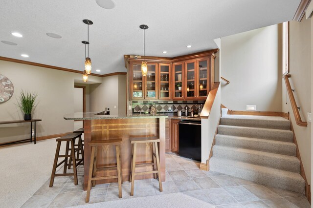 8867 Aviary Path, Inver Grove Heights, MN 55077 - indoor wet bar with black dishwasher, recessed lighting, stairway, tasteful backsplash, and decorative light fixtures