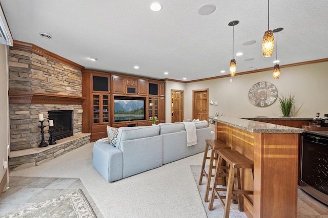 8867 Aviary Path, Inver Grove Heights, MN 55077 - living room featuring bar with sink, ornamental molding, a fireplace, recessed lighting, and light carpet