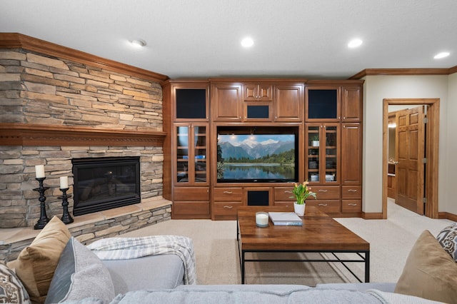 8867 Aviary Path, Inver Grove Heights, MN 55077 - living room with crown molding, carpet flooring, a stone fireplace, baseboards, and recessed lighting