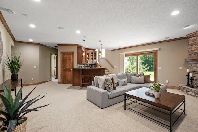 8867 Aviary Path, Inver Grove Heights, MN 55077 - living room with light carpet, ornamental molding, recessed lighting, bar area, and a fireplace