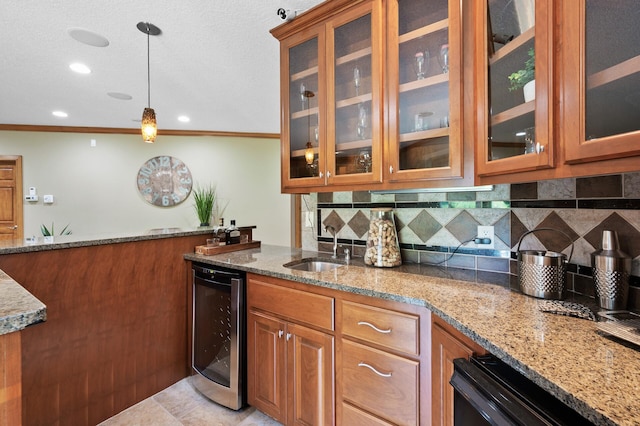 8867 Aviary Path, Inver Grove Heights, MN 55077 - kitchen featuring wine cooler, light stone counters, brown cabinetry, a sink, and backsplash