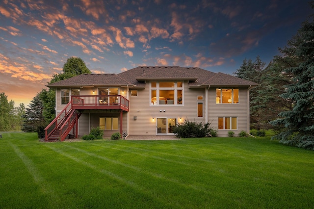 8867 Aviary Path, Inver Grove Heights, MN 55077 - rear view of house featuring stairway, a deck, and a yard