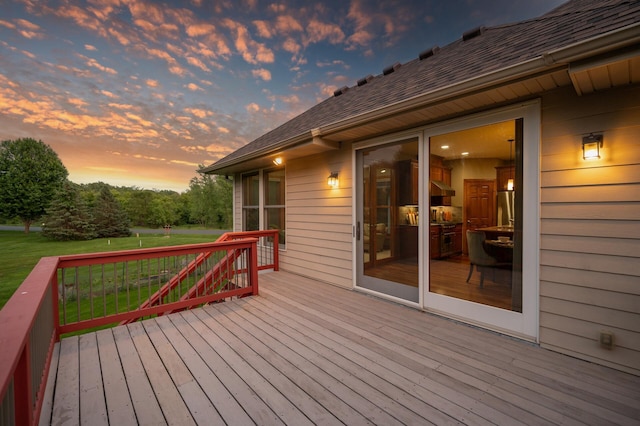 8867 Aviary Path, Inver Grove Heights, MN 55077 - deck at dusk featuring a lawn