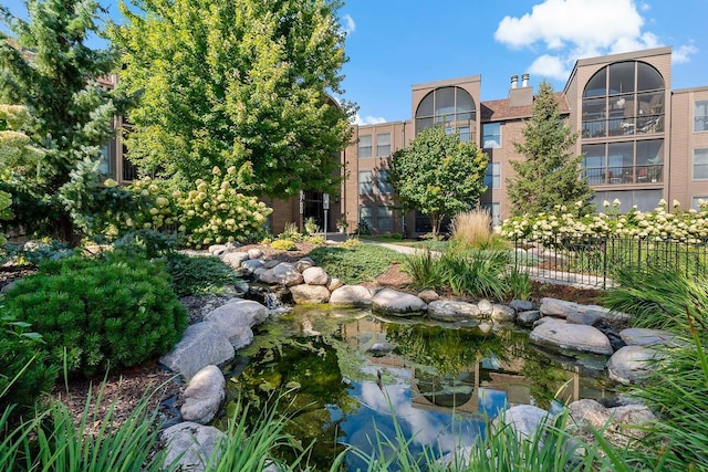 9700 Portland Ave S Unit 334, Bloomington, MN 55420 - view of property's community featuring a small pond