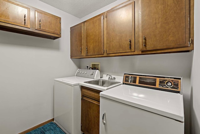 9700 Portland Ave S Unit 334, Bloomington, MN 55420 - laundry area with hookup for a washing machine, cabinet space, and a textured ceiling