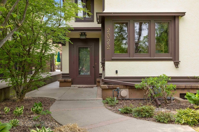 2022 Summit Ave, Saint Paul, MN 55105 - doorway to property with stucco siding
