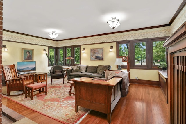 2022 Summit Ave, Saint Paul, MN 55105 - living room featuring light wood-style flooring, baseboards, and crown molding