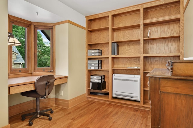 2022 Summit Ave, Saint Paul, MN 55105 - office area with heating unit, hardwood / wood-style flooring, built in study area, and baseboards