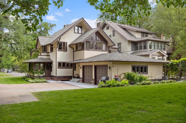 2022 Summit Ave, Saint Paul, MN 55105 - view of front of property with stucco siding, driveway, a front lawn, and central AC