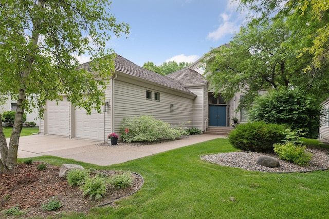 3490 Fairway Ln, Minnetonka, MN 55305 - view of property hidden behind natural elements featuring a front yard, concrete driveway, and a garage