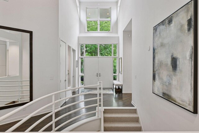 3490 Fairway Ln, Minnetonka, MN 55305 - foyer with a towering ceiling, wood finished floors, and baseboards