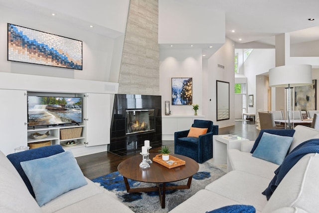 3490 Fairway Ln, Minnetonka, MN 55305 - living area featuring a high ceiling, wood finished floors, a tile fireplace, and recessed lighting