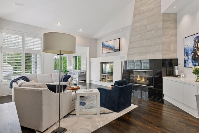 3490 Fairway Ln, Minnetonka, MN 55305 - living room with high vaulted ceiling, dark wood finished floors, a tiled fireplace, and recessed lighting