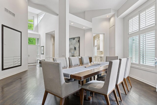 3490 Fairway Ln, Minnetonka, MN 55305 - dining space with a high ceiling, baseboards, dark wood-style floors, and recessed lighting