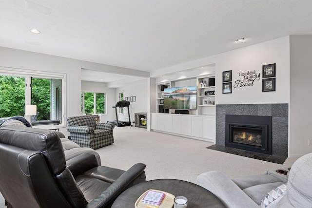 3490 Fairway Ln, Minnetonka, MN 55305 - living room featuring a tile fireplace, carpet flooring, recessed lighting, and built in features