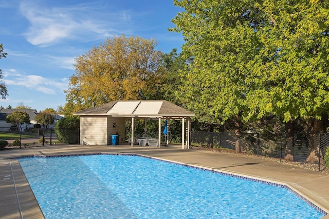 3490 Fairway Ln, Minnetonka, MN 55305 - view of pool featuring a patio area and an outbuilding