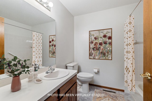 4805 Barbara Ln, Inver Grove Heights, MN 55077 - bathroom featuring vanity, toilet, shower / bath combo, tile patterned floors, and baseboards