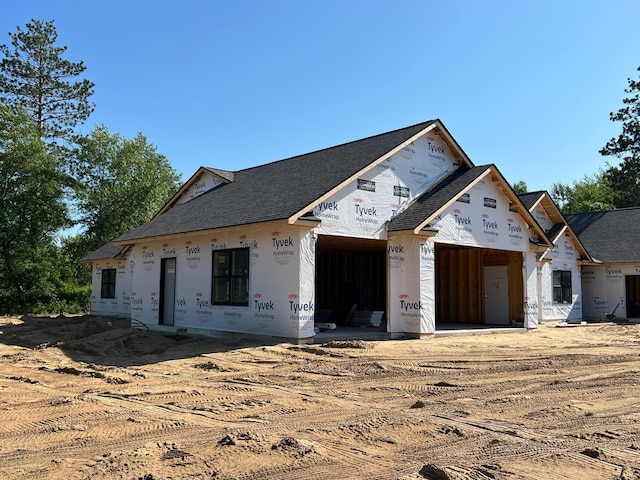 16906 Piper Ln, Brainerd, MN 56401 - property in mid-construction featuring an attached garage and dirt driveway