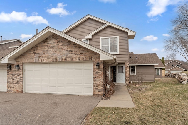 18504 Peach Tree Ct, Minnetonka, MN 55345 - traditional-style house with brick siding, an attached garage, driveway, and a front yard