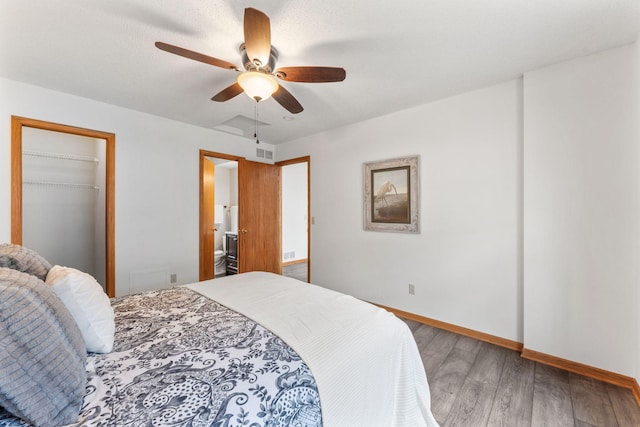 18504 Peach Tree Ct, Minnetonka, MN 55345 - bedroom featuring wood finished floors, baseboards, a closet, and ceiling fan