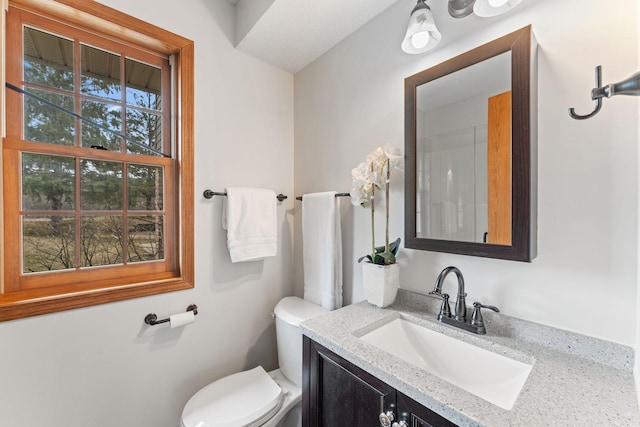 18504 Peach Tree Ct, Minnetonka, MN 55345 - bathroom featuring vanity and toilet