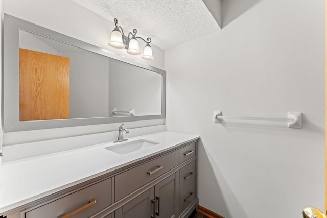 18504 Peach Tree Ct, Minnetonka, MN 55345 - bathroom featuring vanity and a textured ceiling
