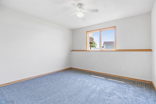 1878 10th St W, West Fargo, ND 58078 - carpeted spare room with a ceiling fan, baseboards, and a textured ceiling