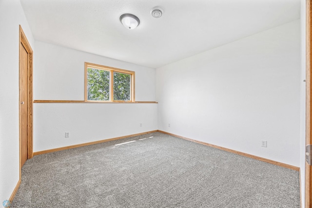 1878 10th St W, West Fargo, ND 58078 - carpeted spare room featuring baseboards