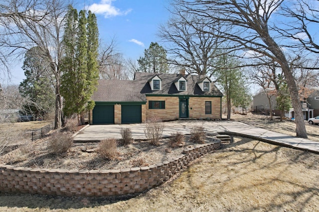 401 21st St SW, Austin, MN 55912 - view of front of home with an attached garage and concrete driveway