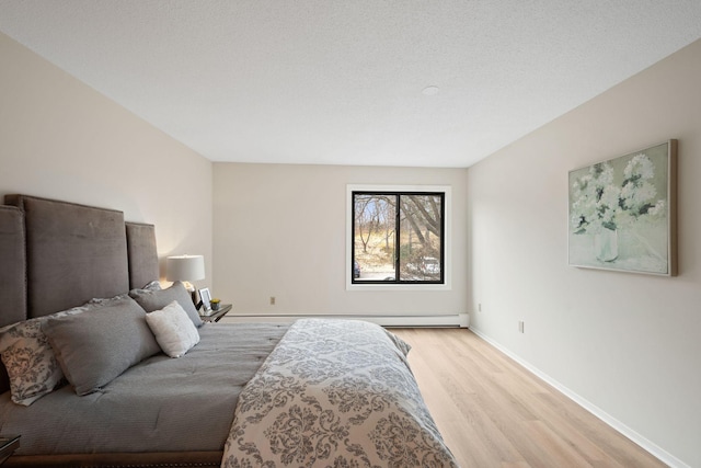 7510 Cahill Rd Unit 103B, Edina, MN 55439 - bedroom featuring wood finished floors and baseboards