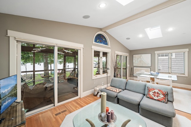 475 Lakeview Ave, Tonka Bay, MN 55331 - living room featuring a skylight, plenty of natural light, wood finished floors, and recessed lighting