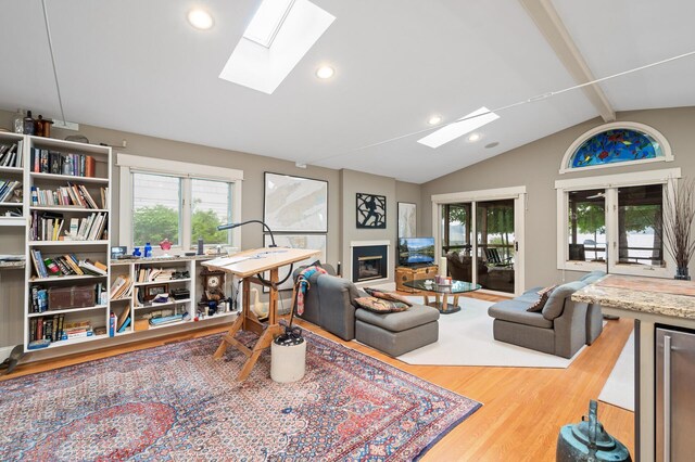 475 Lakeview Ave, Tonka Bay, MN 55331 - living room featuring a skylight, wood finished floors, healthy amount of natural light, and recessed lighting