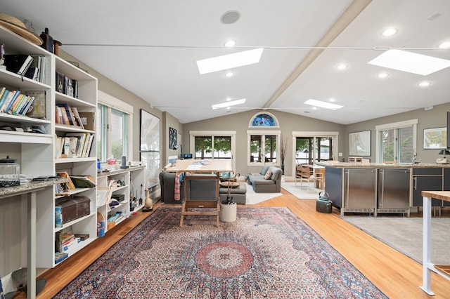 475 Lakeview Ave, Tonka Bay, MN 55331 - home office featuring a skylight, wood finished floors, lofted ceiling, and recessed lighting