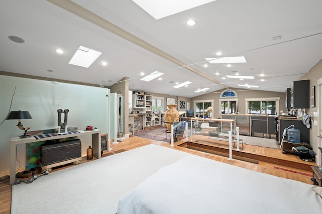 475 Lakeview Ave, Tonka Bay, MN 55331 - bedroom featuring a skylight, wood finished floors, and lofted ceiling