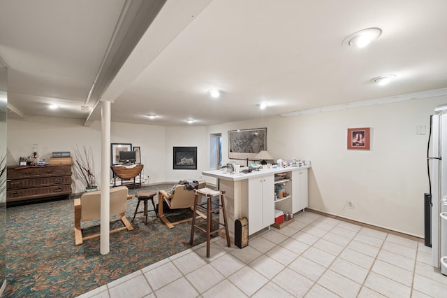 475 Lakeview Ave, Tonka Bay, MN 55331 - kitchen featuring a peninsula, light tile patterned floors, open shelves, and light countertops