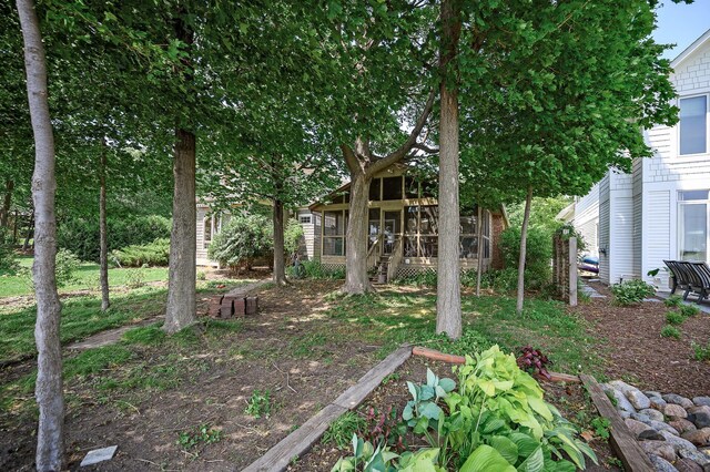 475 Lakeview Ave, Tonka Bay, MN 55331 - view of yard featuring a sunroom