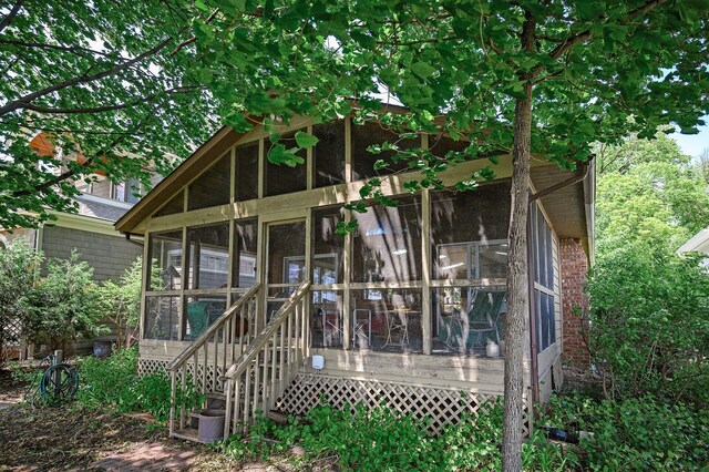 475 Lakeview Ave, Tonka Bay, MN 55331 - rear view of property with a sunroom