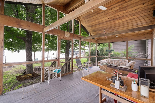475 Lakeview Ave, Tonka Bay, MN 55331 - sunroom with lofted ceiling, a water view, an outdoor living space, and outdoor dining space