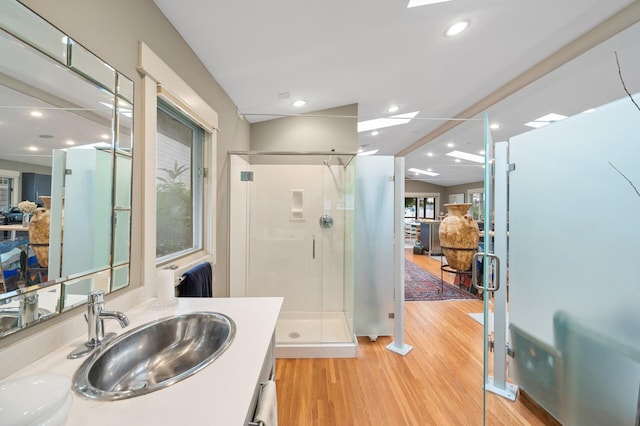 475 Lakeview Ave, Tonka Bay, MN 55331 - full bath with a stall shower, wood finished floors, vanity, and recessed lighting