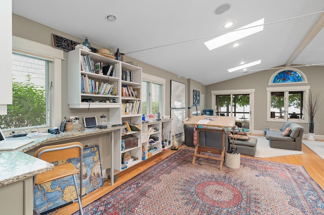 475 Lakeview Ave, Tonka Bay, MN 55331 - office with wood finished floors, a skylight, plenty of natural light, lofted ceiling, and recessed lighting