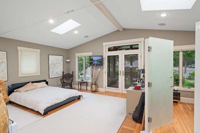 475 Lakeview Ave, Tonka Bay, MN 55331 - bedroom featuring a skylight, access to outside, light wood-style flooring, multiple windows, and recessed lighting