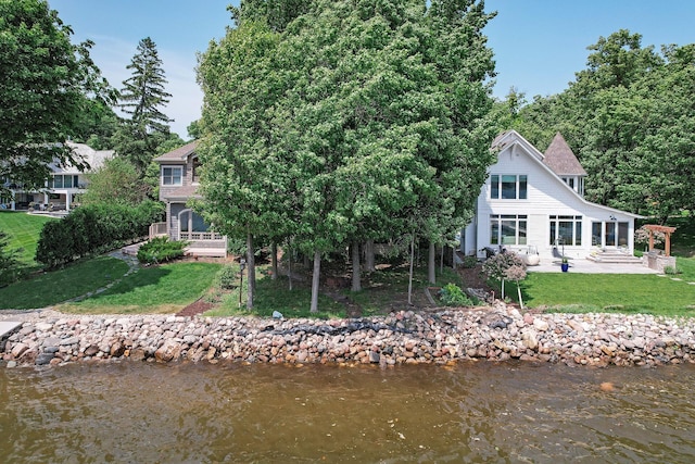 475 Lakeview Ave, Tonka Bay, MN 55331 - rear view of house with a patio, a lawn, and a water view