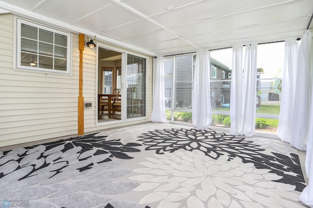 509 32nd St N, Moorhead, MN 56560 - unfurnished sunroom featuring wood walls