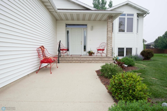 1010 4th Ave NE, Dilworth, MN 56529 - property entrance with covered porch and a yard