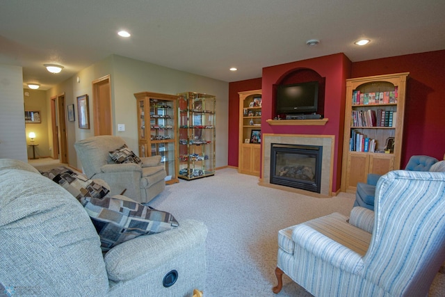 1010 4th Ave NE, Dilworth, MN 56529 - carpeted living room featuring a tiled fireplace and recessed lighting
