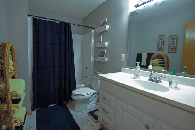 1010 4th Ave NE, Dilworth, MN 56529 - bathroom featuring vanity, tile patterned floors, toilet, and shower / tub combo