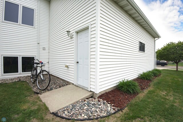 1010 4th Ave NE, Dilworth, MN 56529 - view of property exterior with a yard