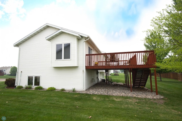 1010 4th Ave NE, Dilworth, MN 56529 - back of house with stairs, a deck, and a yard