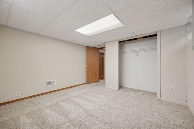 3933 Dartmouth Dr, Minnetonka, MN 55345 - unfurnished bedroom with carpet floors, a paneled ceiling, and a closet